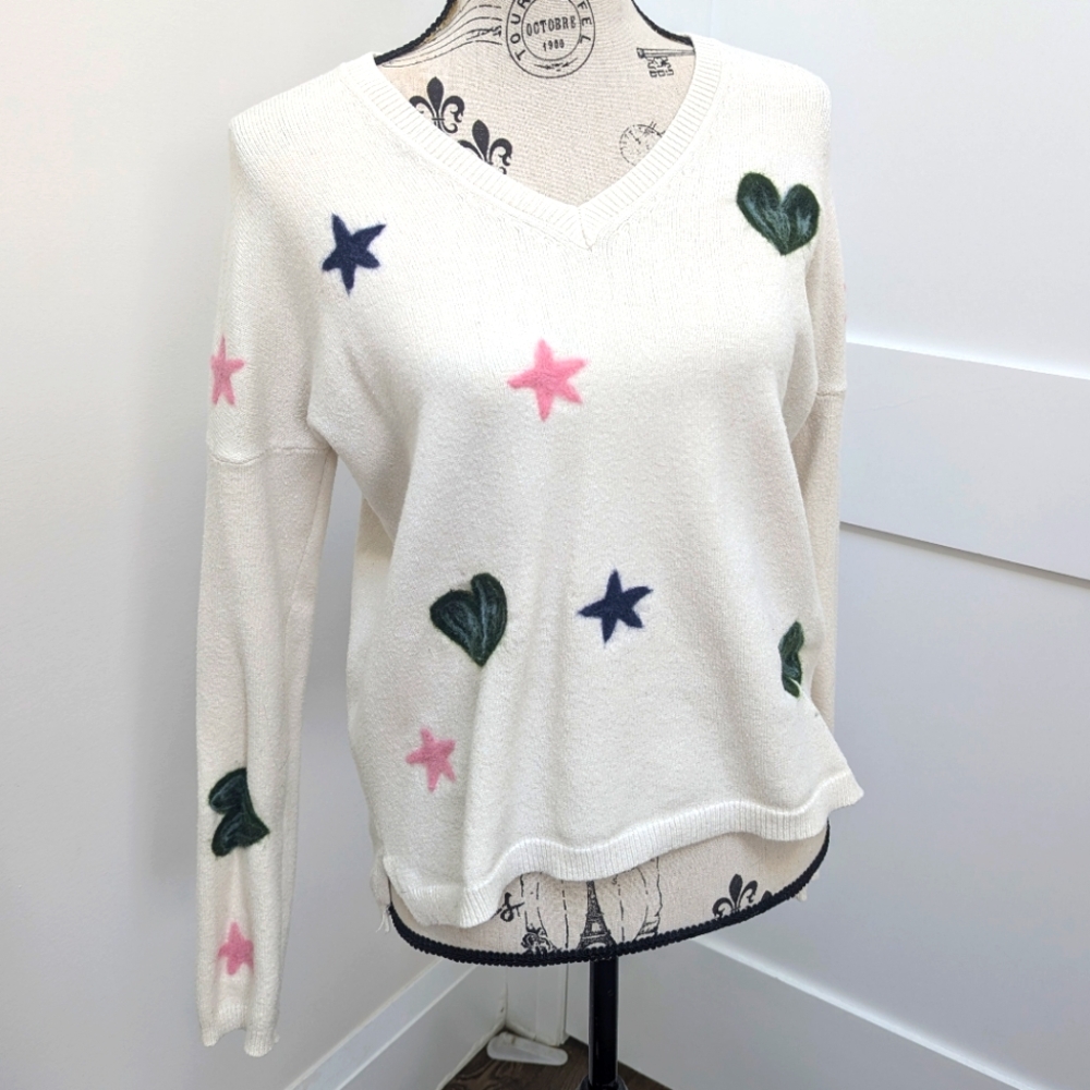 Barbie-inspired v-neck sweater soft with embroidered hearts and stars